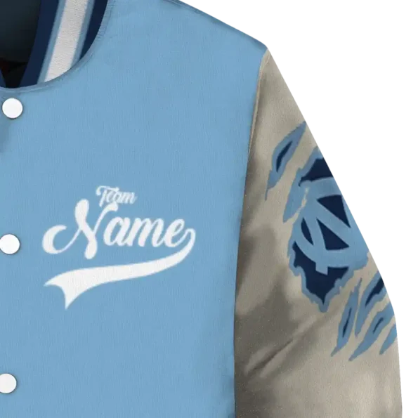 custom north carolina tar heels wildcat pawprint light blue nude varsity jacket premium grade.webp