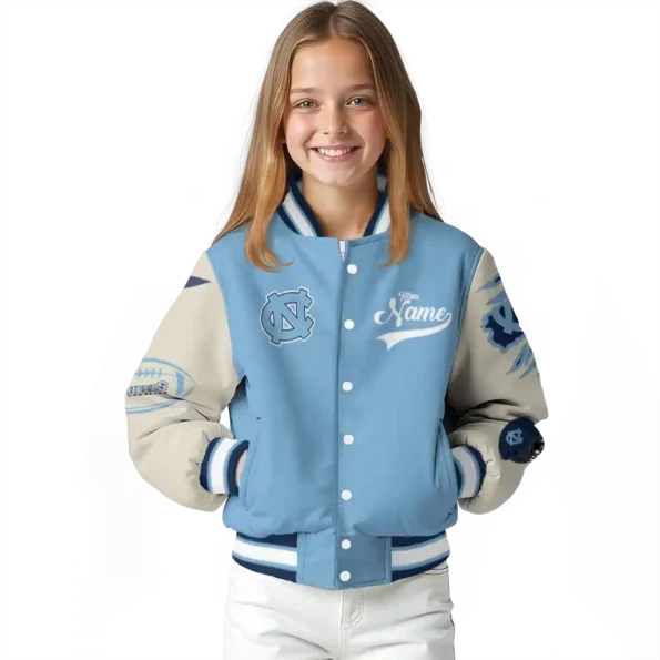 custom north carolina tar heels wildcat pawprint light blue nude varsity jacket top rated.webp