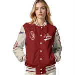 custom oklahoma sooners wildcat pawprint crimson nude varsity jacket best selling.webp