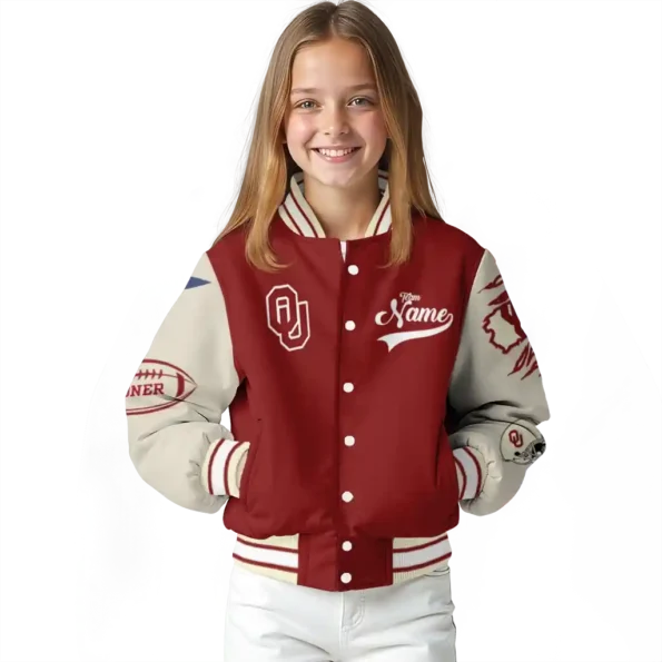 custom oklahoma sooners wildcat pawprint crimson nude varsity jacket top rated.webp