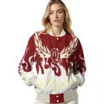 custom oklahoma sooners winged blaze crimson white varsity jacket best selling.webp