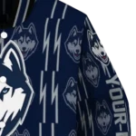 custom uconn huskies bolt stripe blue varsity jacket best selling.webp