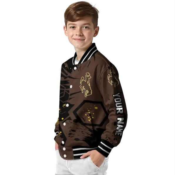 custom wyoming cowboys hexagon cluster brown black varsity jacket trendy.webp