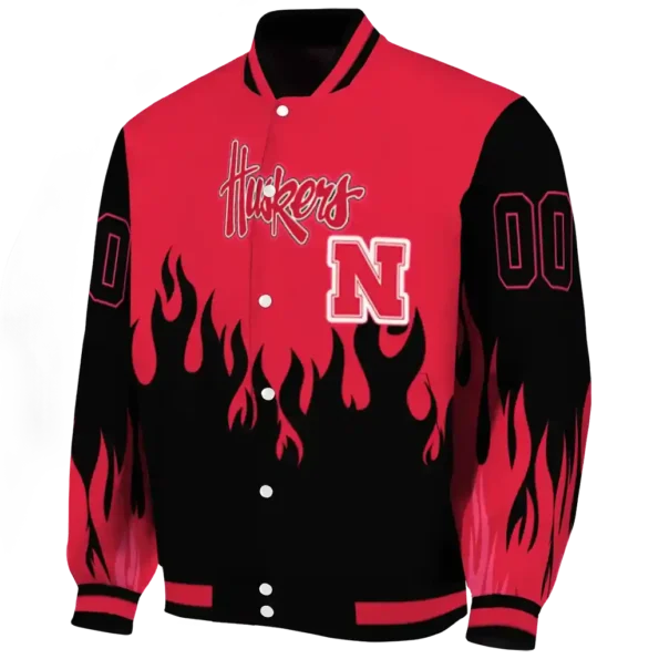 customized nebraska cornhuskers flame border red black varsity jacket best selling.webp