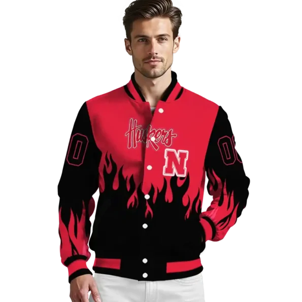 customized nebraska cornhuskers flame border red black varsity jacket high quality.webp