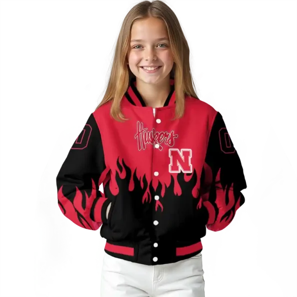 customized nebraska cornhuskers flame border red black varsity jacket top rated.webp