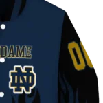 customized notre dame fighting irish flame border navy black varsity jacket best selling.webp