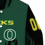 customized oregon ducks flame border green black varsity jacket best selling.webp