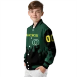 customized oregon ducks flame border green black varsity jacket best selling.webp