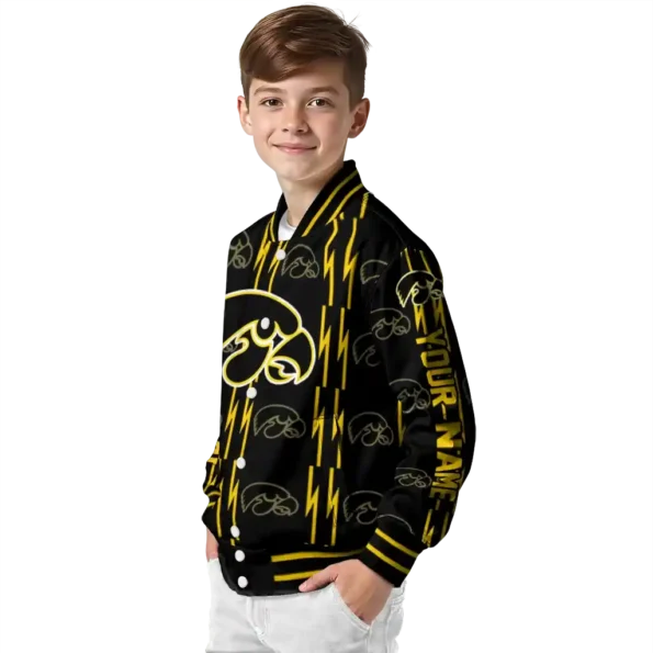 personalized iowa hawkeyes bolt stripe black varsity jacket trendy.webp