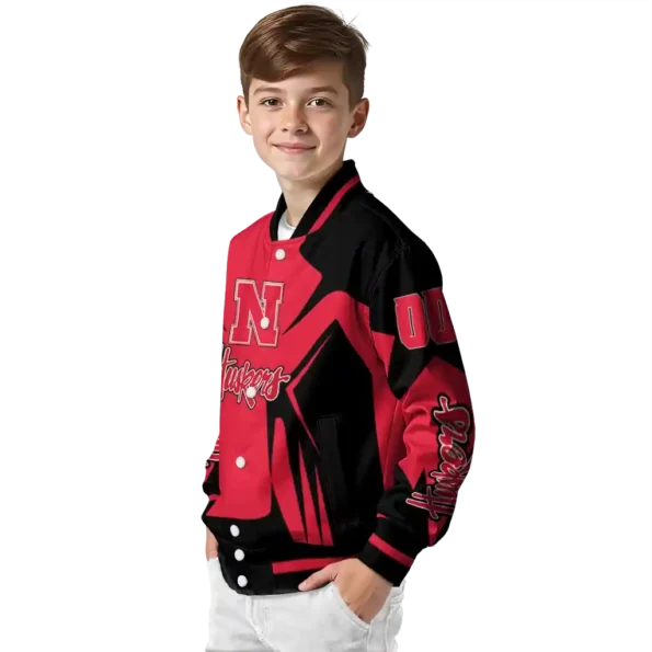 personalized nebraska cornhuskers spider mark red black varsity jacket trendy.webp