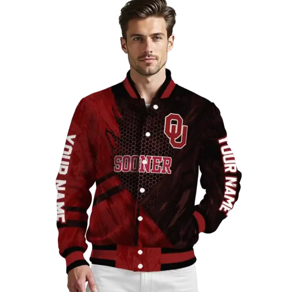personalized oklahoma sooners hexagon mesh crimson black varsity jacket high quality.webp