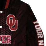 personalized oklahoma sooners hexagon mesh crimson black varsity jacket best selling.webp