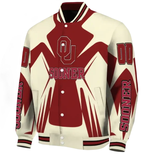 personalized oklahoma sooners spider mark crimson cream varsity jacket best selling.webp