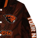 personalized oregon state beavers hexagon mesh orange black varsity jacket best selling.webp