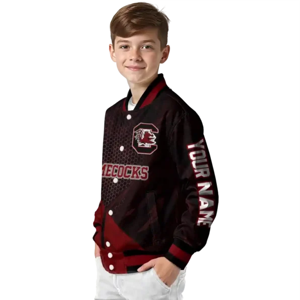 personalized south carolina gamecocks hexagon mesh garnet black varsity jacket trendy.webp