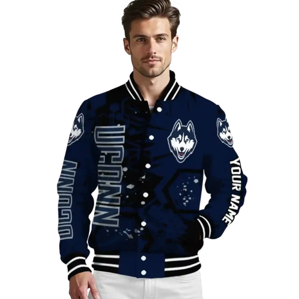 personalized uconn huskies hexagon cluster blue black varsity jacket high quality.webp