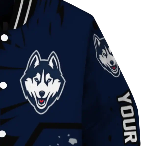 personalized uconn huskies hexagon cluster blue black varsity jacket premium grade.webp