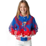 custom-kansas-jayhawks-winged-blaze-blue-white-varsity-jacket-best-selling.webp