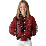 custom-oklahoma-sooners-hexagon-cluster-crimson-black-varsity-jacket-best-selling.webp