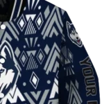 custom-uconn-huskies-pyramid-shapes-blue-varsity-jacket-best-selling.webp