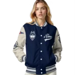 custom-uconn-huskies-wildcat-pawprint-blue-nude-varsity-jacket-best-selling.webp