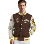 custom-wyoming-cowboys-wildcat-pawprint-brown-nude-varsity-jacket-best-selling.webp