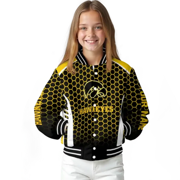 customized iowa hawkeyes hexagon grid black varsity jacket top rated.webp