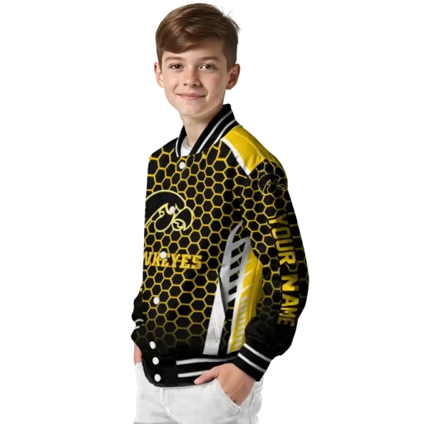 customized iowa hawkeyes hexagon grid black varsity jacket trendy.webp