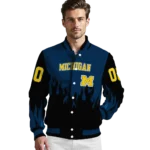 customized-michigan-wolverines-flame-border-blue-black-varsity-jacket-best-selling.webp