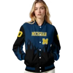 customized-michigan-wolverines-flame-border-blue-black-varsity-jacket-best-selling.webp