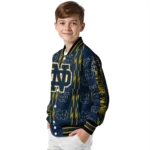 customized-notre-dame-fighting-irish-bolt-stripe-navy-varsity-jacket-best-selling.webp