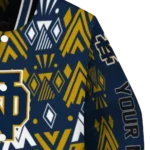customized-notre-dame-fighting-irish-pyramid-shapes-navy-varsity-jacket-best-selling.webp