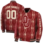 customized-oklahoma-sooners-bolt-stripe-crimson-varsity-jacket-best-selling.webp