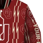 customized-oklahoma-sooners-bolt-stripe-crimson-varsity-jacket-best-selling.webp