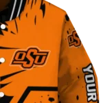customized-oklahoma-state-cowboys-hexagon-cluster-orange-black-varsity-jacket-best-selling.webp