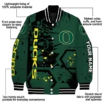 customized-oregon-ducks-hexagon-cluster-green-black-varsity-jacket-best-selling.webp
