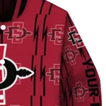 customized-san-diego-state-aztecs-bolt-stripe-red-varsity-jacket-best-selling.webp