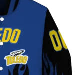 customized-toledo-rockets-flame-border-blue-black-varsity-jacket-best-selling.webp
