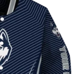 customized-uconn-huskies-chevron-arrow-blue-varsity-jacket-best-selling.webp