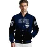customized-uconn-huskies-flame-border-blue-black-varsity-jacket-best-selling.webp