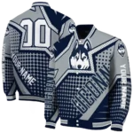 customized-uconn-huskies-star-burst-blue-varsity-jacket-best-selling.webp