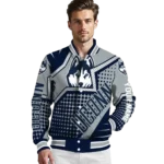 customized-uconn-huskies-star-burst-blue-varsity-jacket-best-selling.webp