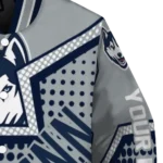 customized-uconn-huskies-star-burst-blue-varsity-jacket-best-selling.webp