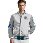 customized-utah-state-aggies-speckled-arms-navy-gray-varsity-jacket-best-selling.webp