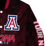 personalized-arizona-wildcats-hexagon-mesh-red-black-varsity-jacket-best-selling.webp