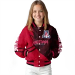 personalized-arizona-wildcats-hexagon-mesh-red-black-varsity-jacket-best-selling.webp
