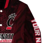 personalized-cincinnati-bearcats-hexagon-mesh-red-black-varsity-jacket-best-selling.webp