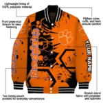 personalized-clemson-tigers-hexagon-cluster-orange-black-varsity-jacket-best-selling.webp