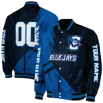 personalized-creighton-bluejays-hexagon-mesh-blue-black-varsity-jacket-best-selling.webp